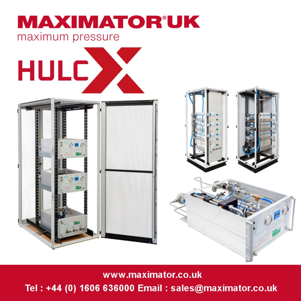 A modular machine in a cabinet rack with the door open, showing the modules inside